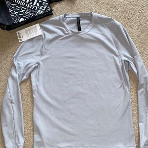 Men’s Lululemon Surge Warm LS Sweater NWT and bag